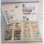 Two collector's world postage stamp albums mostly comprising of African issues to include