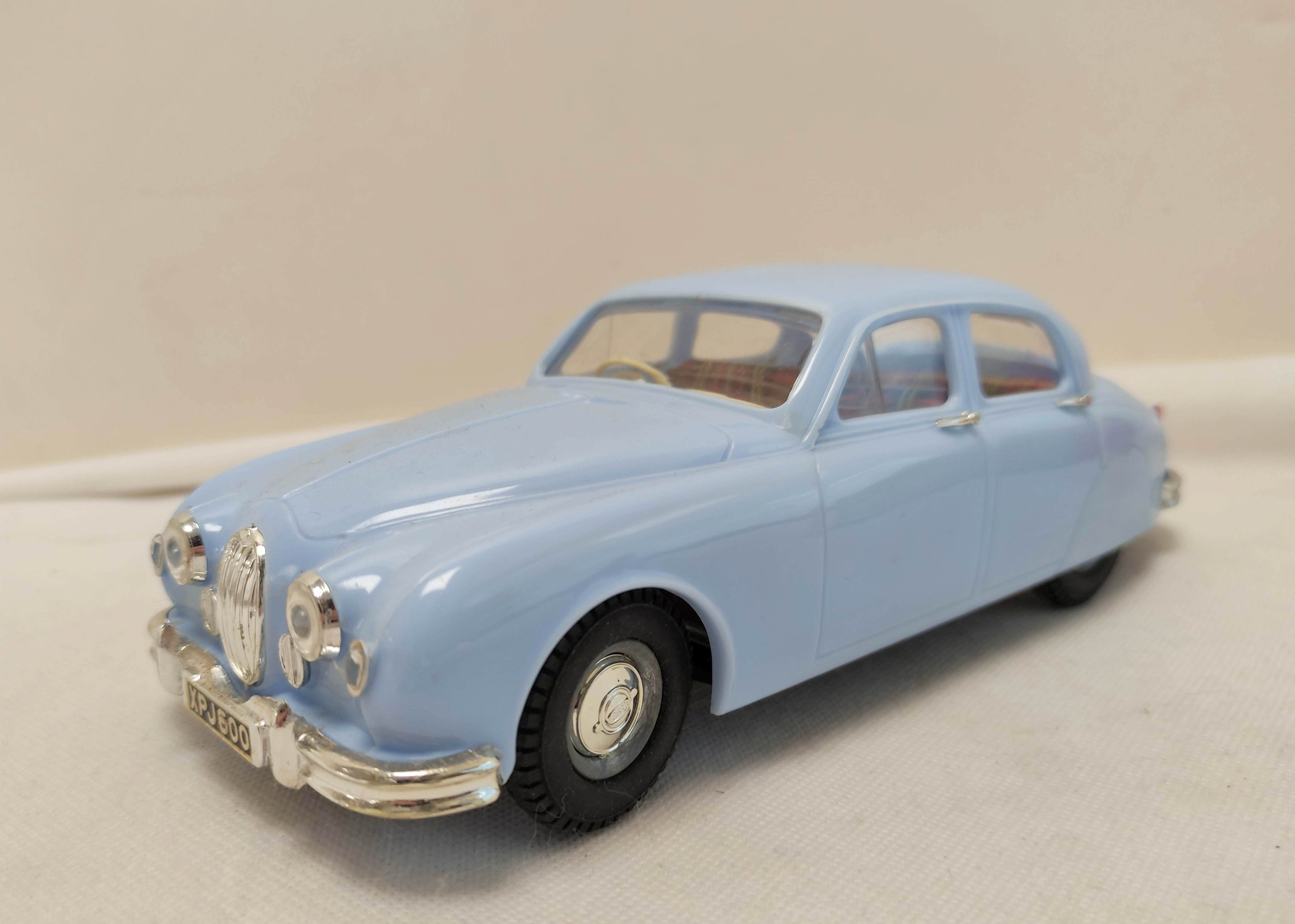 Tri-ang 1/20 scale Electric 2.4 Litre Jaguar in sky blue paint. Original box present but bashed - Image 4 of 8