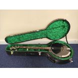 Barnes and Mullins No1 Perfect banjo with mother of pearl design in hard fitted case, with stand.