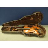 Antique German 1/2 size copy of a violin by Masini, with spruce top and one piece maple back. In 4/4