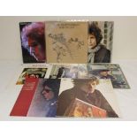 Collection of Bob Dylan albums to include 'Slow Train Coming', 'At Budokan', etc.