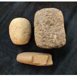 Three stone implements from Bahia Pina Panama possibly Cuna civilisation to include two stone rubber