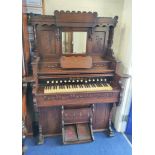Antique Victorian pedal palace organ by Loring & Blake Organ Co., with carved mirrored top. In