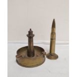 WW1/2 trench art lighter constructed from a .50 caliber casing and a brass ashtray with a lighthouse