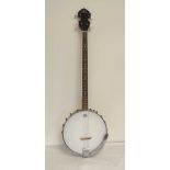 Modern Deacon four string tenor banjo measuring 96cms in length with Remo Weatherking drum head.