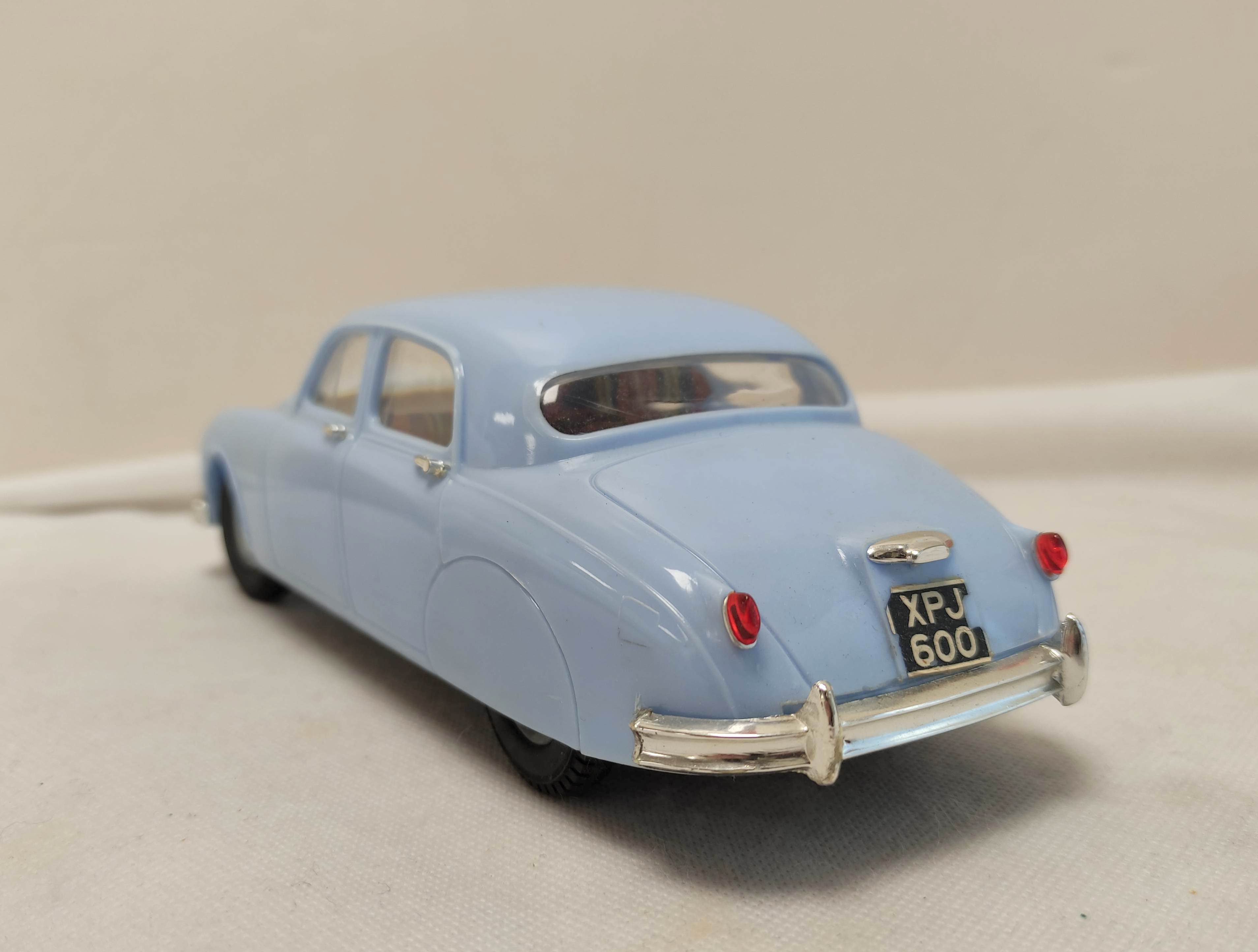 Tri-ang 1/20 scale Electric 2.4 Litre Jaguar in sky blue paint. Original box present but bashed - Image 6 of 8