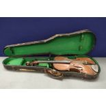 Antique late 19th century 4/4 violin, likely of German origin. With spruce top and one piece maple