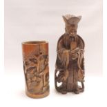 Chinese carved hardwood figure of a sage or scholar, signed with incised character marks, 30cm high;