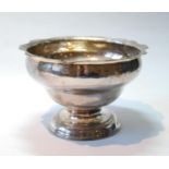 Silver sugar bowl of typical Scottish style with flat wavy engraved edge on moulded foot, by Lothian