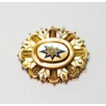 Victorian gold oval brooch with enamelled star, 11.9g gross.