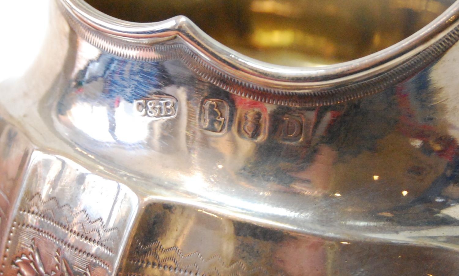 Silver cream jug of panelled ovoid shape, fluted corners and engraved bands, maker C & B (untraced), - Image 2 of 3