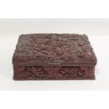 Chinese cinnabar lacquer lidded box of rectangular form with carved decoration of a five-clawed