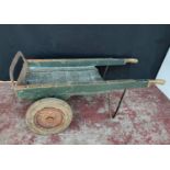 Painted wood and iron antique railway station barrow, 118cm high.