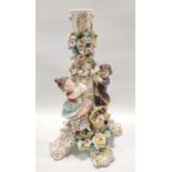 Sitzendorf porcelain candlestick, the acanthus moulded column adorned with flowers and garland