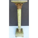 Green variegated marble Corinthian-style pedestal with a square plinth top above a cylindrical