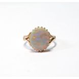 Harlequin opal ring, flat, approximately 13mm x 10mm, in gold multi-claw setting, '9ct', size M.