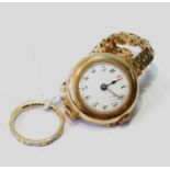 Lady's 18ct gold watch on 9ct gold bracelet, and a ring, 22g gross.  (2)