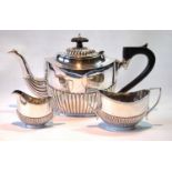 Silver three-piece tea set, oval fluted, Chester and Birmingham 1904/5, 495g or 15½oz.