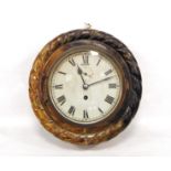 Late 19th century carved wood wall clock, the circular dial with Roman numerals and subsidiary