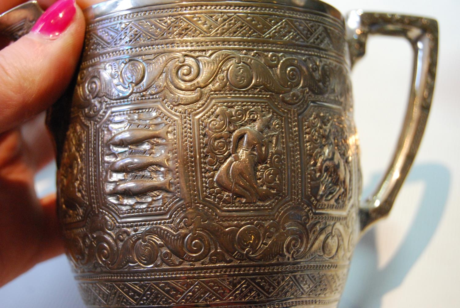 Four-piece silver tea set of ovoid shape embossed with the signs of the zodiac and bands of scrolls, - Image 5 of 9