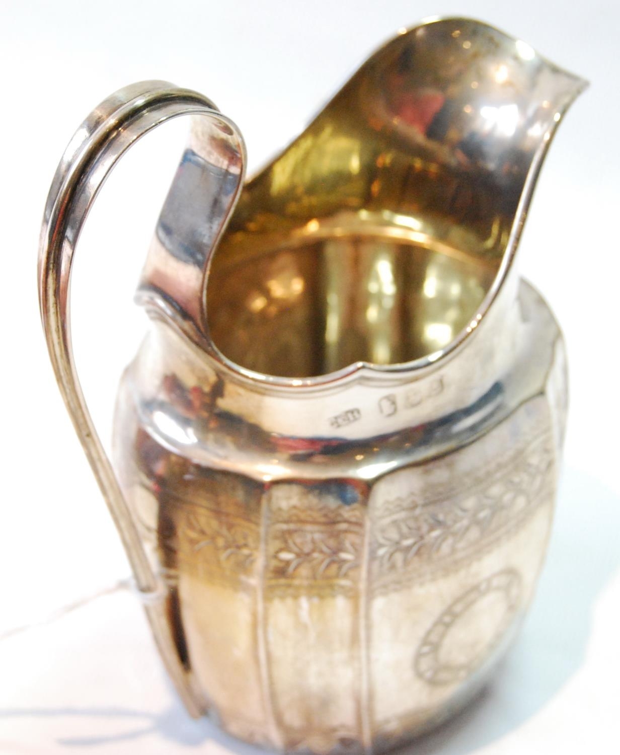 Silver cream jug of panelled ovoid shape, fluted corners and engraved bands, maker C & B (untraced), - Image 3 of 3