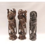Pair of Chinese carved hardwood figures of deities with inlaid yellow metal wiring, 30cm and 29cm