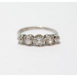 Diamond five-stone ring, the largest old-cut brilliant approximately .5ct, in platinum, size N.