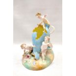 Meissen porcelain figure group of three cherubs clambering over a broken ewer, underglaze blue