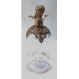 Glass 'glug glug' decanter with pierced and embossed silver mounts and stopper, by Henry Matthews,