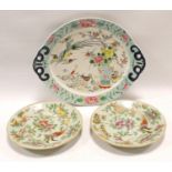 Pair of Chinese Canton famille rose celadon ground side plates decorated with exotic birds and