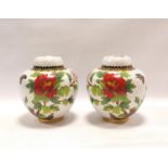 Pair of modern cloisonné vases of covered squat baluster form, decorated with polychrome flowers and