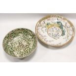 Chinese porcelain prunus blossom bowl with green ground, painted red three-character mark, 24cm