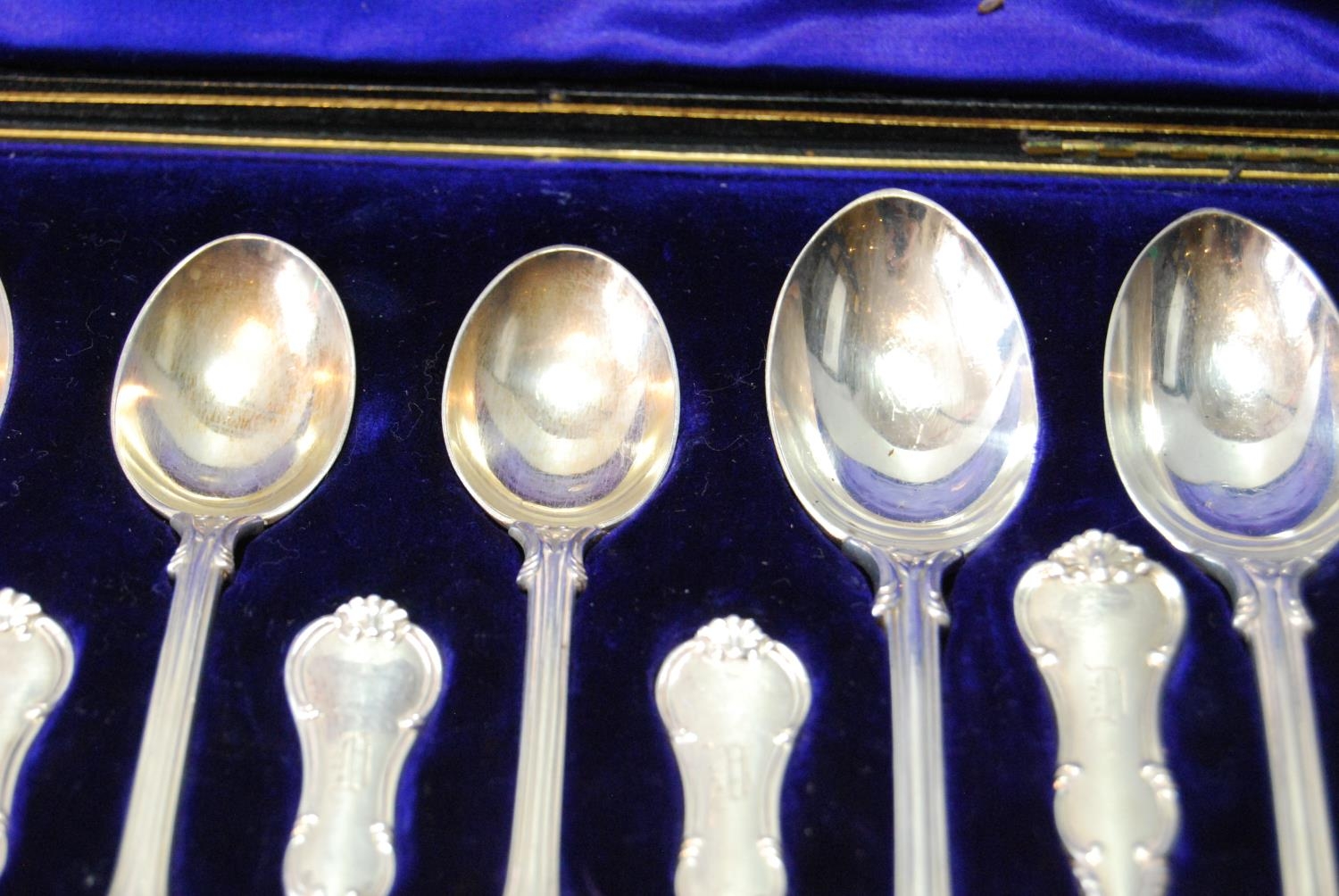 Set of twelve silver teaspoons with scroll borders with six matching coffee spoons, by The - Image 4 of 7