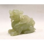 Chinese green hardstone figure of a recumbent kylin, 6.5cm high.
