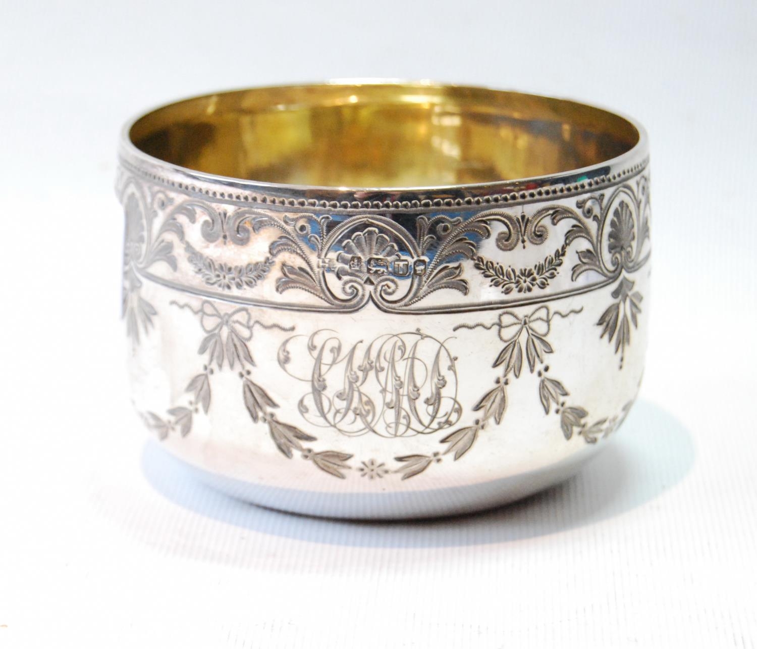 Silver porringer with engraved swags, 1886.