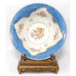 Dresden porcelain bowl by Donath & Co., decorated with floral panels on a white ground with blue