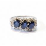 Triple cluster ring with angled diamonds and sapphires, in white gold, '585', size O.