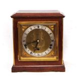 Triple train mantel clock by JW Benson of London, the gilt dial decorated with mask spandrels,
