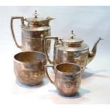 Four-piece silver tea set of ovoid shape embossed with the signs of the zodiac and bands of scrolls,