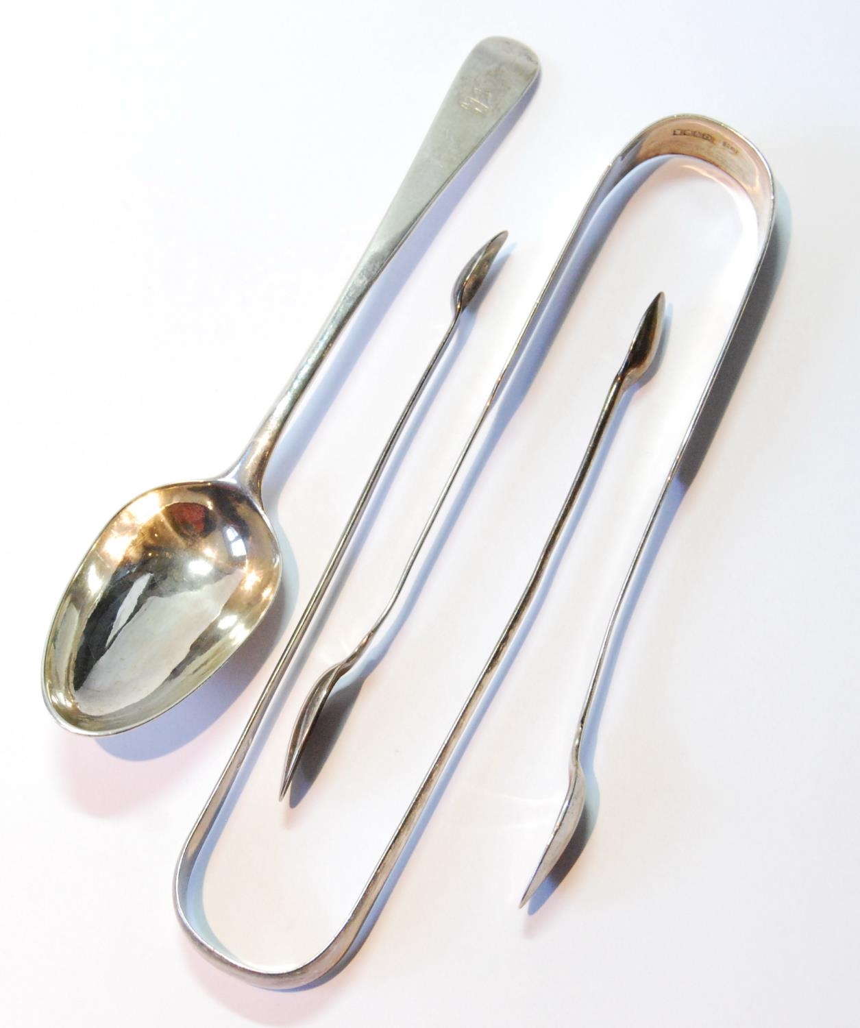 Cork: silver dessert spoon by Carden Terry, c. 1770, a set of sugar tongs, Dublin 1836, and another,