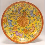 Chinese porcelain shallow porcelain dish with yellow ground decorated with bats, peaches and