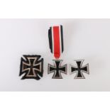 German WWII iron cross dated 1939, a German post WWII iron cross with brooch reverse (oak leaves not