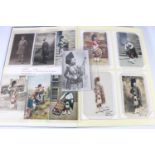 An album of postcards titled "The Black Watch The Royal Highland Regiment" containing around 65