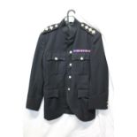 British Army uniform, a black jacket having Gaunt of London King's Own Scottish Borderers
