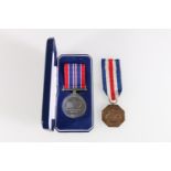 Italy, a D-Day Dodger medal [unnamed] in fitted case and a Dominica Meritorious service award [