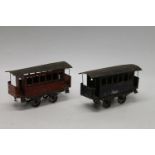 Two Early Schoenner type gauge II (2 1/2" (64mm) gauge) passenger coaches, number I red and number