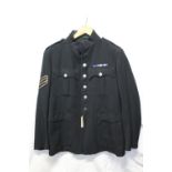 British Army uniform, a black jacket with Uniform Clothing and Equipment label "Jacket Man's Blue