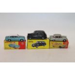 Diecast model vehicles including Budgie Toys 101 London Taxi Cab and Dinky Toys 135 Triumph 2000 and