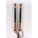 Two Victorian Scottish police truncheons, the black body with painted crowned VR cypher above the