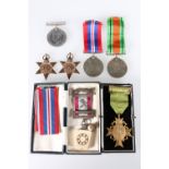 WWII war medal and defence medal in carboard issue case addressed "Mr W Lewis, 1 Burt Road, Grange